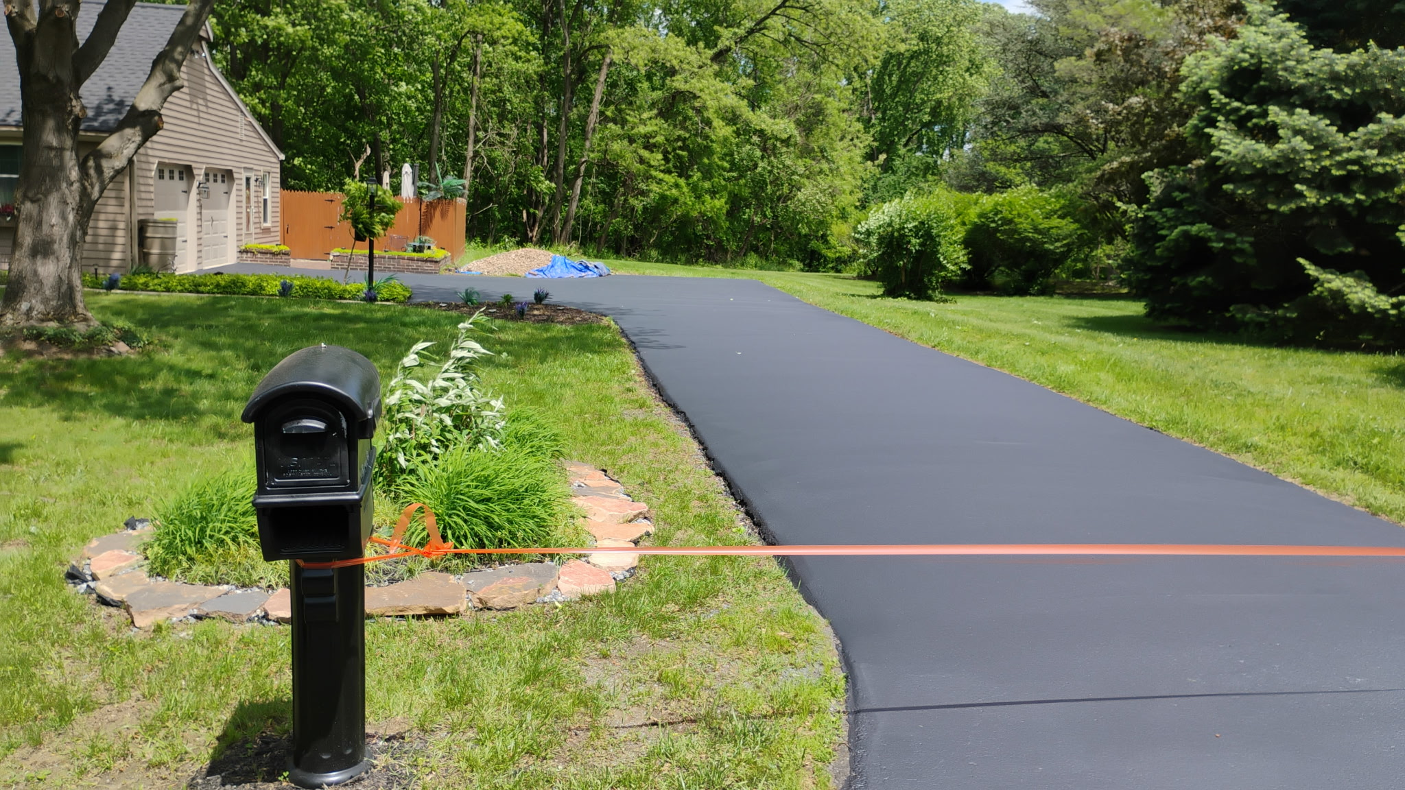 Before and after driveway sealing in York Haven PA